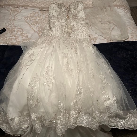 Used Wedding dress. Size 16
Ivoire by Kitty Chen - Picture 3 of 5